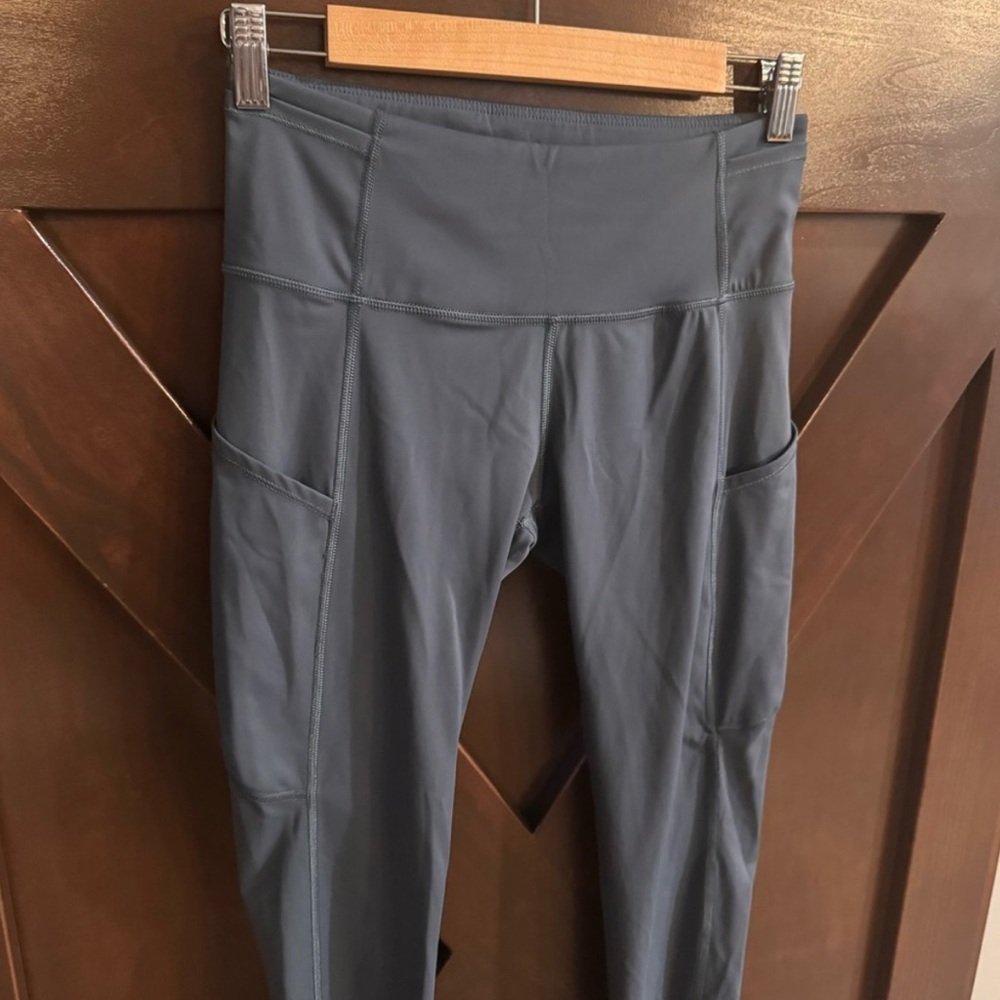 Lululemon 25 "Fast and Free High Rise Reflective Leggings w/pockets size 8